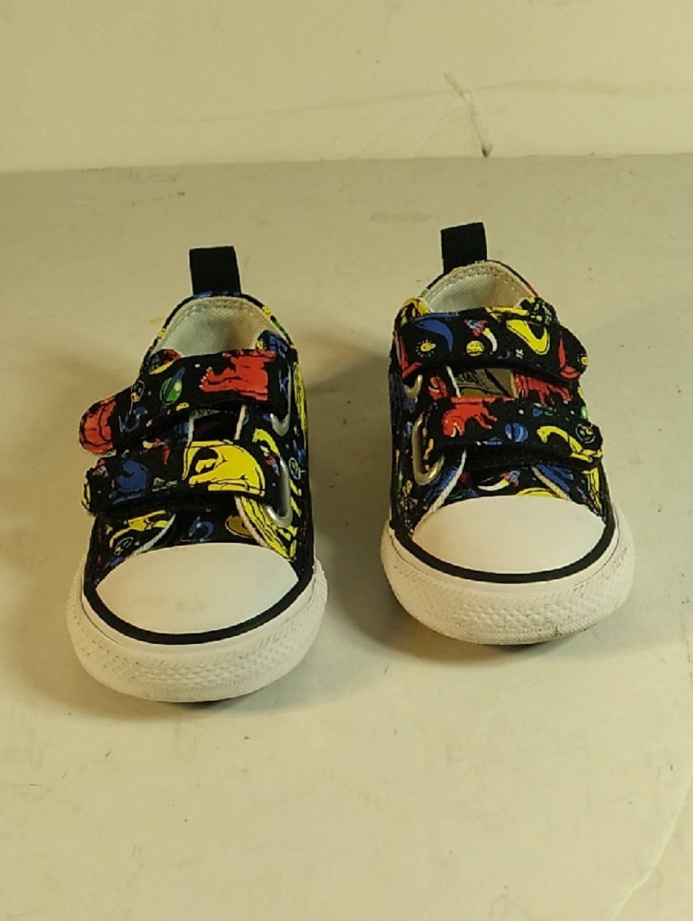 Converse Little Kids Black Canvas Sneakers with Red Yellow Blue Accents, Size 5.
